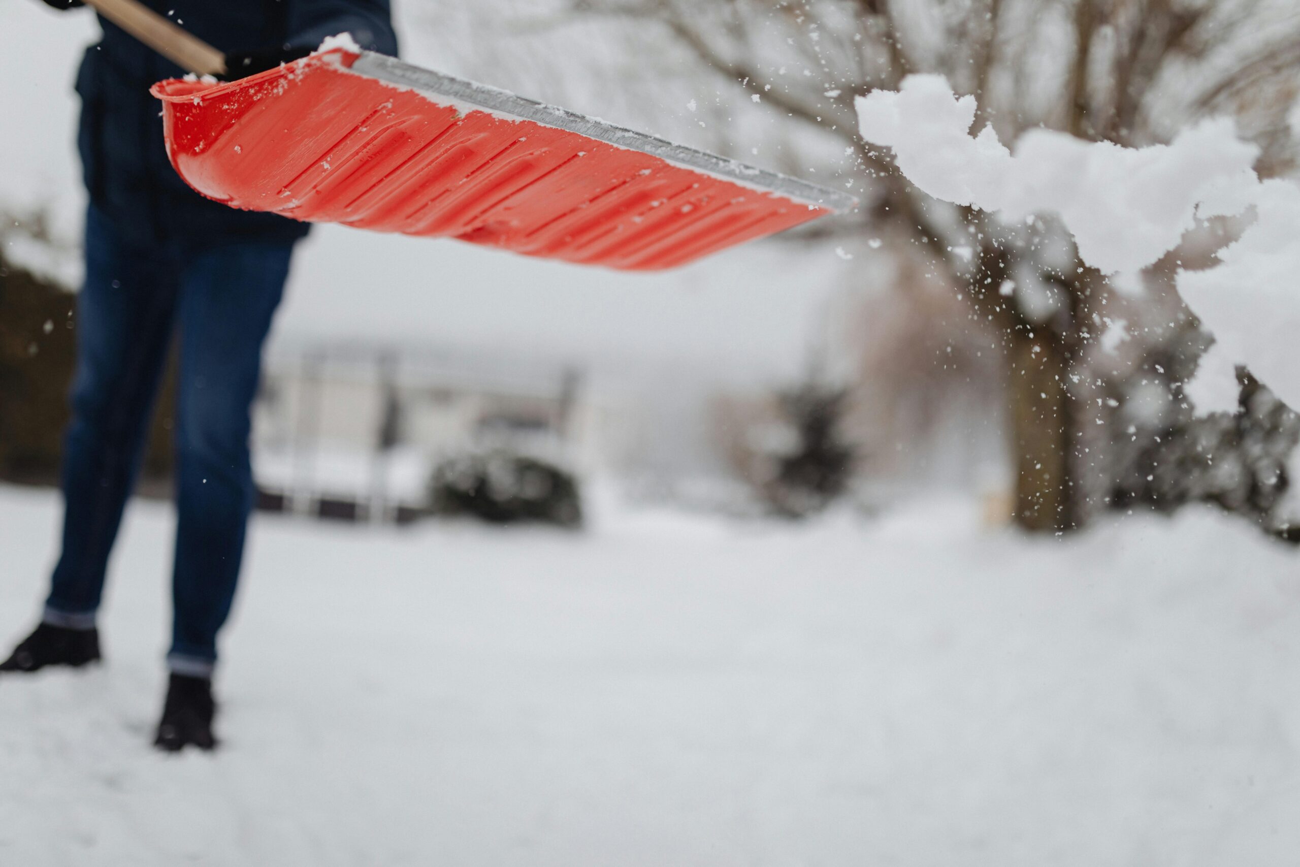 A Person Shoveling Snow